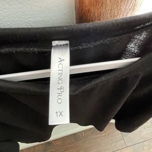 Womans flutter sleeve black top